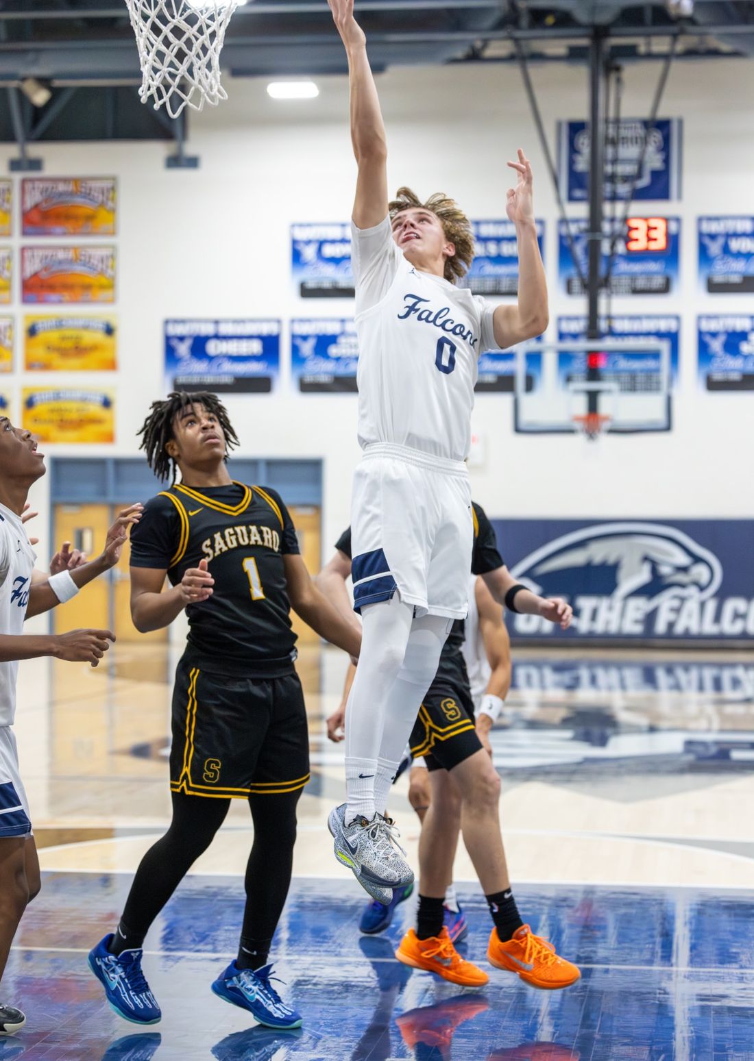 Jack Gaston finishing over a defender