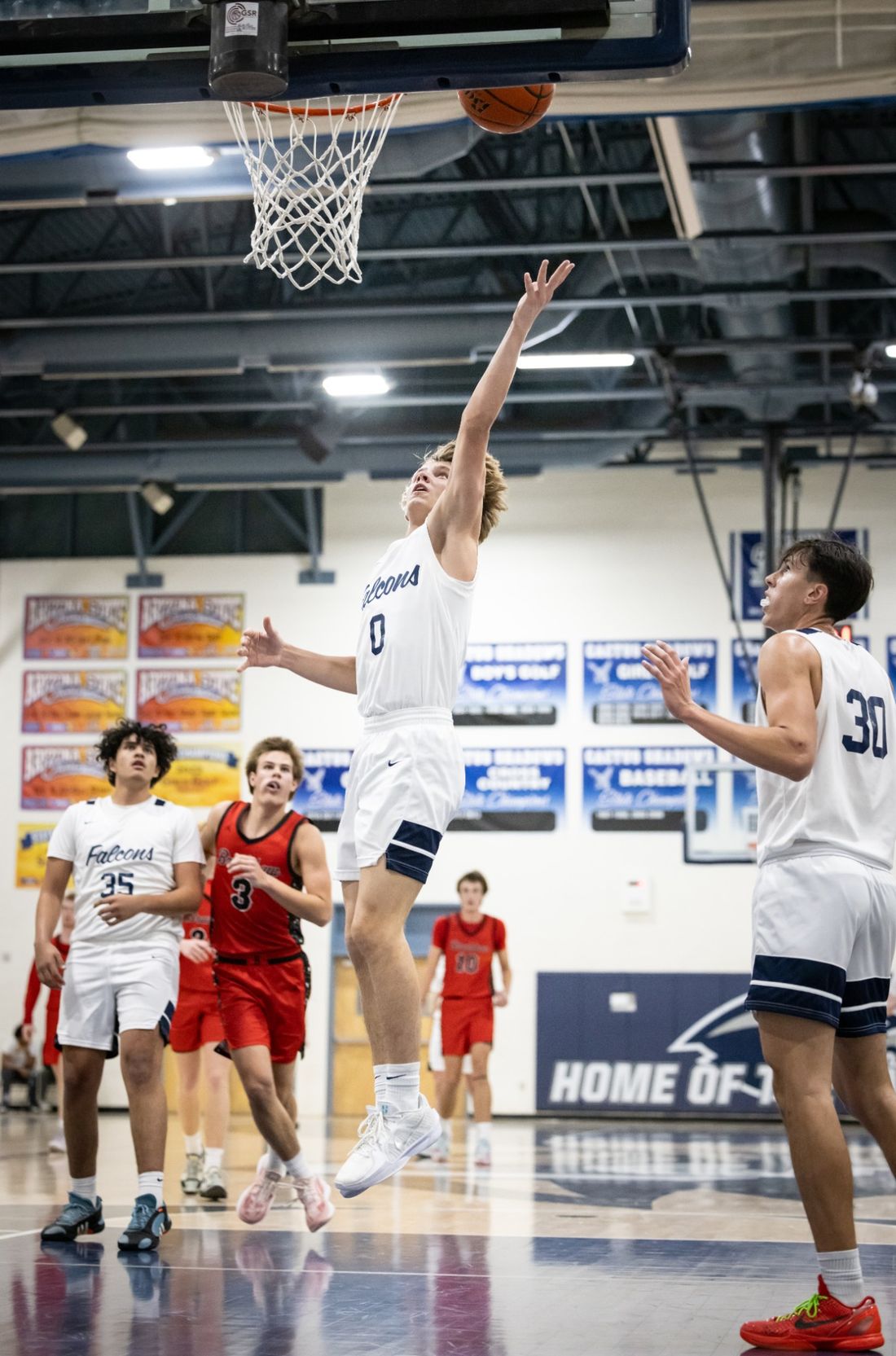 Jack Gaston finishing a layup